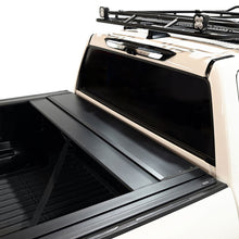 Load image into Gallery viewer, Westin Manual Retractable Tonneau Cover 22-26 Toyota Tundra 5.5ft Bed Black